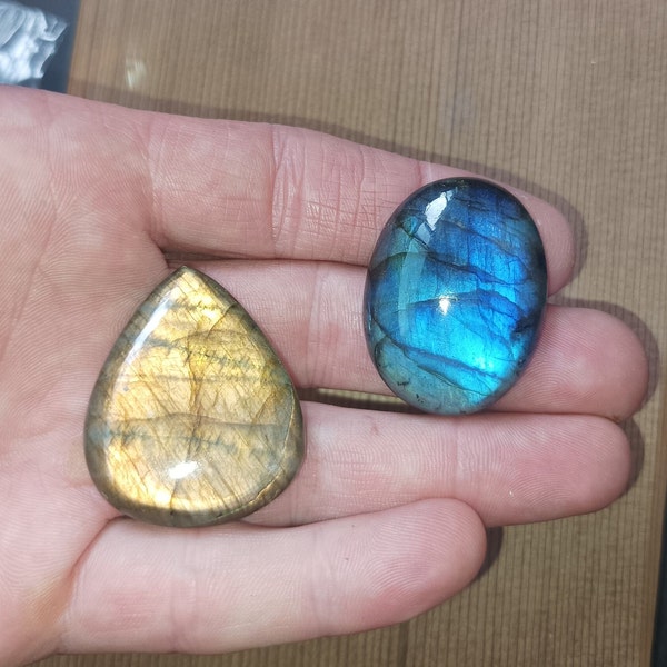 Sublime pair of natural intense Royal blue and bright golden yellow Madagascar Labradorite of 77 and 80 carats magnificent iridescence