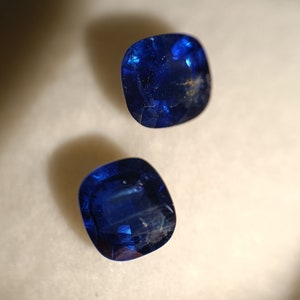 Sublime very rare pair 100% natural vivid royal blue sapphires from Vietnam Luc Yen unheated 2.30 carats cushion cut.