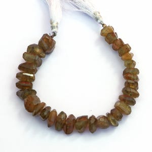 AAA Natural Vessonite Garnet Beads: Faceted Nuggets, 8 Inch Strand