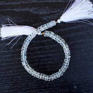 AAA Crystal Quartz Beads: 6-7mm Heishi Wheel, 8 Inch Strand