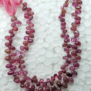 Natural Pink Sapphire Beads: Smooth Oval Gemstone Strand (5-8mm)