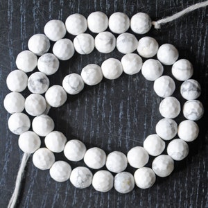 Faceted White Howlite Gemstone Beads: 7mm Round, 13 Inch Strand