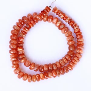 Natural Red Sunstone Beads: Faceted Roundel Strand (7-10mm, 8 Inch)