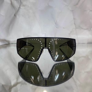 2000s Jean Paul Gaultier unisex black punctured shield sunglasses
