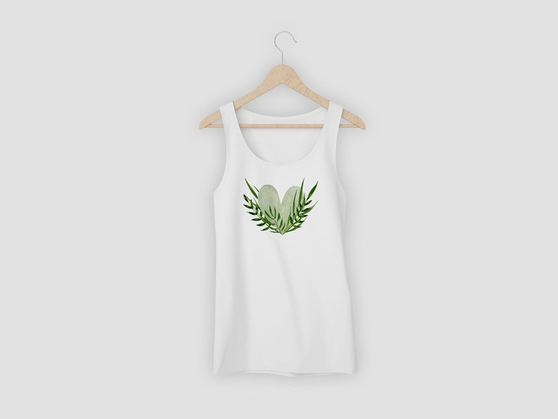 May include: White tank top with a green watercolor heart design featuring leaves.