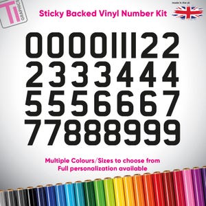 May include: A sticky backed vinyl number kit featuring black sans-serif numerals zero through nine arranged in rows. The text reads Sticky Backed Vinyl Number Kit, Ti Graphics, made in the uk, and Multiple Colours/Sizes to choose from Full personalization available.