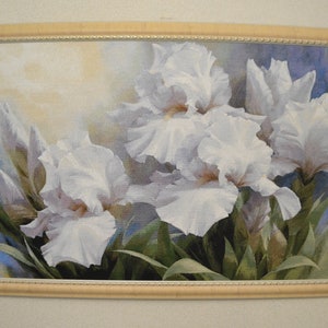 Completed cross-stitched white Irises Cross-stitched flowers