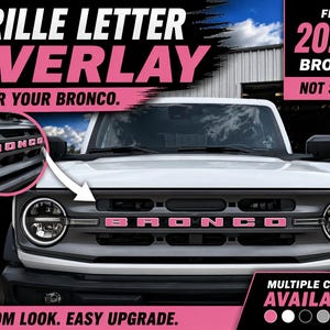 May include: Pink grille letter overlays for a 2021+ Bronco. The image shows the word "BRONCO" in pink letters on the vehicle's grille. The text "GRILLE LETTER OVERLAY" and "COLOR YOUR BRONCO" are also visible. The product is made of premium vinyl and is weather resistant.