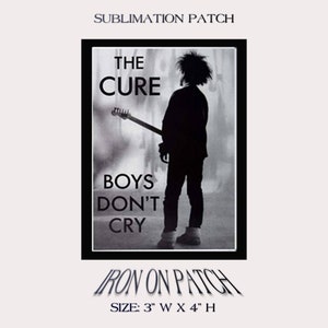 May include: Black and white sublimation iron-on patch featuring a silhouette of a person holding a guitar with the text "The Cure" and "Boys Don't Cry". The patch is 7.6 cm wide and 10.2 cm high.