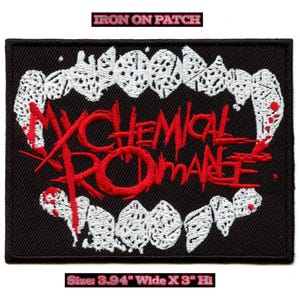 May include: Black rectangular iron-on patch with the text "IRON ON PATCH" at the top. The patch features a stylized mouth design with white teeth and the words "MY CHEMICAL ROMANCE" in red. The patch measures 10 cm wide x 7.6 cm high.