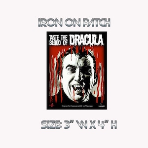 May include: Iron-on patch featuring a black and white image of Dracula's face with red dripping blood. The text "Taste the Blood of Dracula" is above the image. The patch is 3 inches wide by 4 inches high.