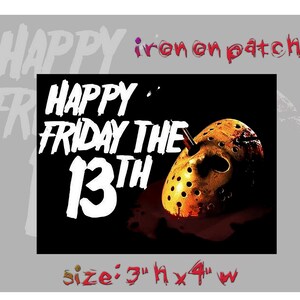 May include: Iron-on patch featuring a white graphic on a black background. The graphic says "Happy Friday the 13th" with a large number "13" and a hockey mask with a bloody knife sticking out of it. The patch is 7.6 cm high by 10.2 cm wide.