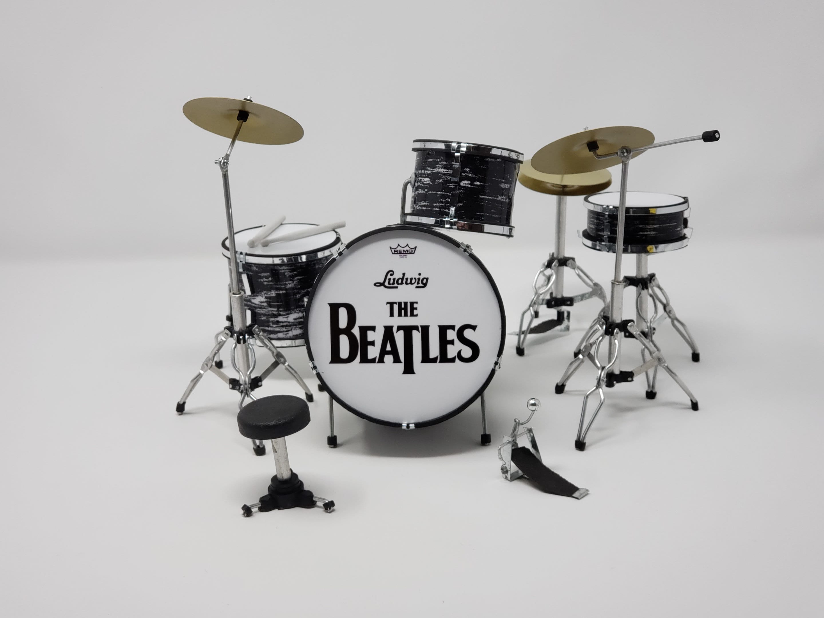 bateria musical miniatura - regalo de los beatles 