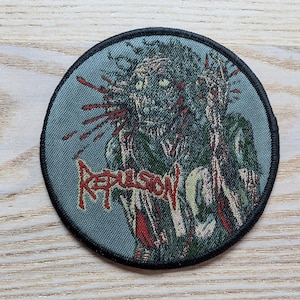 Repulsion Earache Woven Patch 9.5cm Diameter