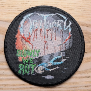Obituary Slowly We Rot Woven Sew On Patch 9.5cm Diameter
