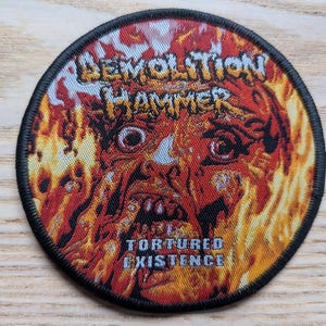 Demolition Hammer Tortured Woven Sew On Patch 9.5cm Diameter