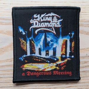 King Diamond A Dangerous Meeting Woven Sew On Patch 9 x 10cm