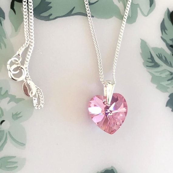 Swarovski pendant deals light