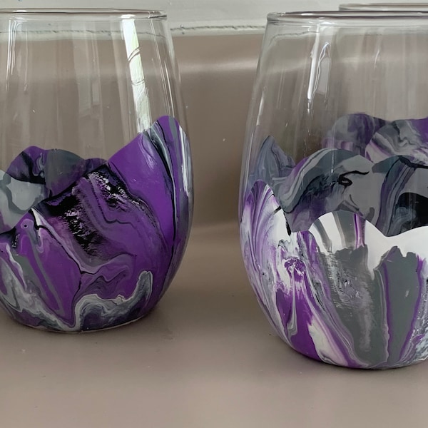 Marbled wine glasses in purple,grey, white and black.