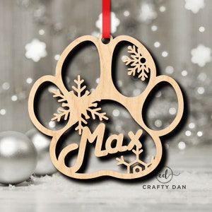 Dog christmas tree decoration. Personalised paw shaped bauble ornament. Custom made with a name.