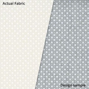 Puede incluir: Primer plano de dos muestras de tela. La muestra de la izquierda es una tela blanca con un pequeño patrón floral blanco. La muestra de la derecha es una tela gris con el mismo patrón floral blanco. El texto "Actual Fabric" está en la esquina superior izquierda y "Design sample" está en la esquina inferior derecha.