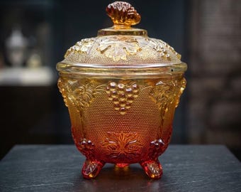 Jeannette Amberina Glass "Grape and Vine" Pattern Footed Candy Dish with Lid