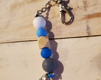 Silicone and wood beaded keychain with suede tassel