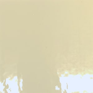 May include: A light beige background with a white, cloudy, textured pattern at the bottom.