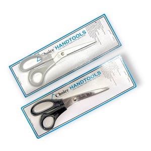May include: Two pairs of scissors packaged on white and blue cardboard. The scissors are made for glass artists. The text on the packaging reads "Choice HANDTOOLS Tools specially made for the glass artist."