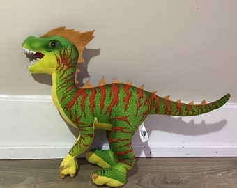 Peluche de dinosaurio raptor verde híbrido de Jurassic Park