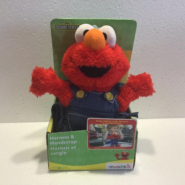 Sesame Street Elmo overalls Plush Harness & Handstrap Keeps Child at a Safe Distance in Crowded Places.