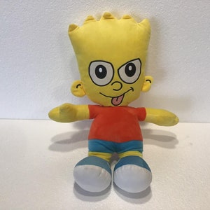 May include: Yellow plush toy of Bart Simpson from The Simpsons. He is wearing a red shirt, blue trousers, and has a mischievous expression on his face.