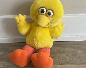 Pelúcia vintage do Garibaldo (Big Bird) da Tyco Baby com bolso.