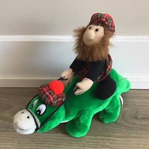 Thistle Products Ltd knuffel, Schotse man rijdende dinosaurus