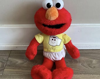セサミストリート レアなヴィンテージ 楽しいエルモのぬいぐるみ 押す
