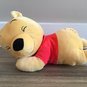 Disney Winnie l&#39;ourson en peluche pour bébé qui dort