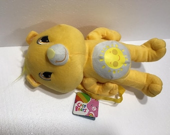 Mochila de Urso de Pelúcia Amarela