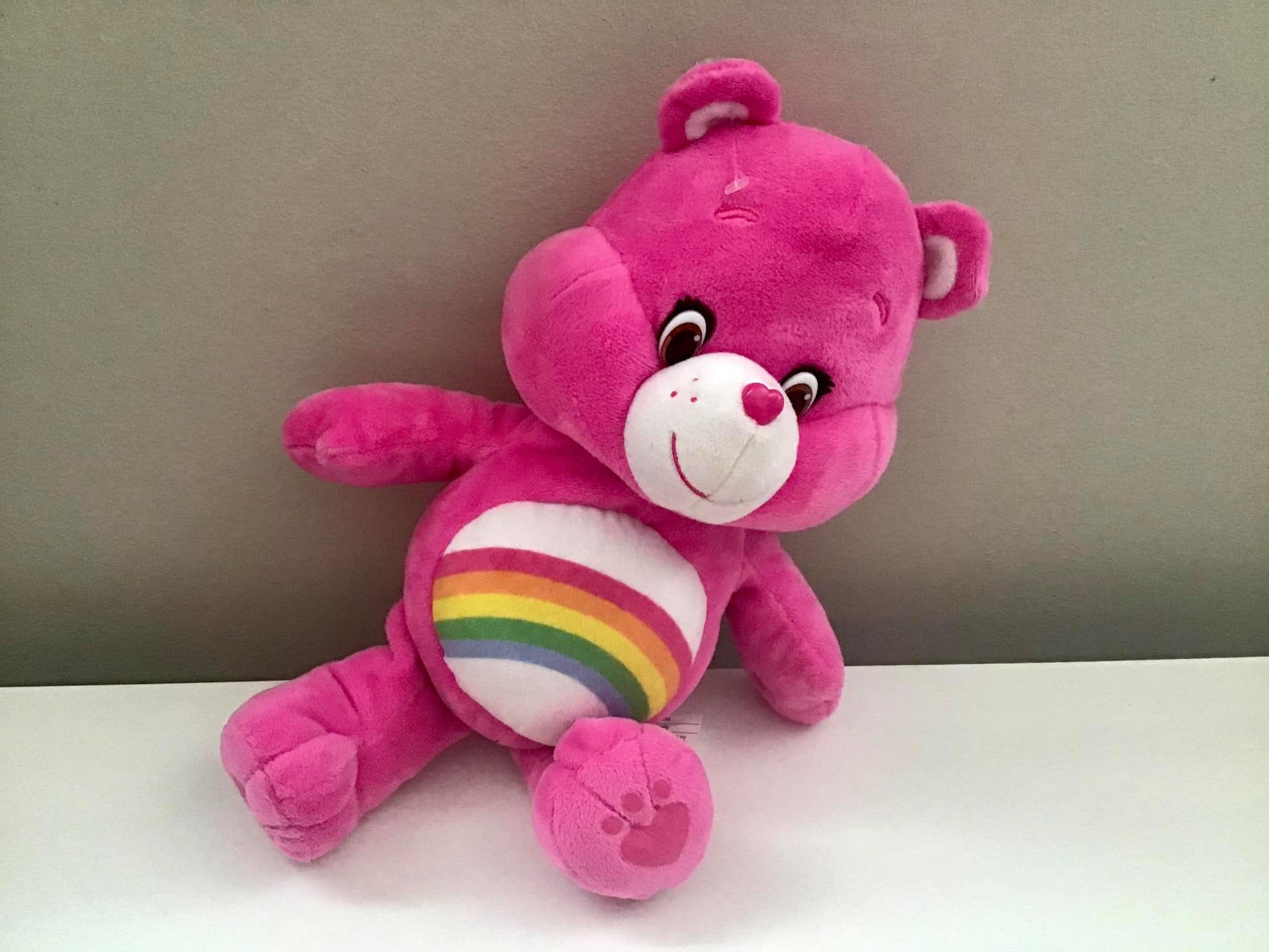 Pink care bear with rainbow outlet