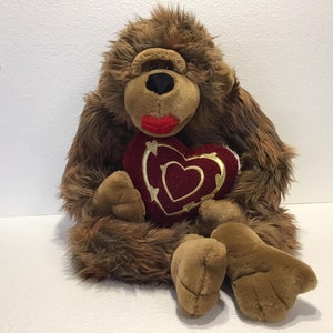 Grande scimmia gorilla di peluche con cuore morbido e coccoloso