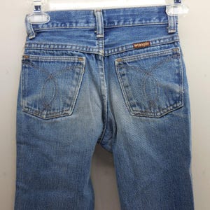 Vintage Wrangler Youth Jeans 10 Regular Tillverkade i USA Blå Thrashed 22x23 595BSWR bild 4