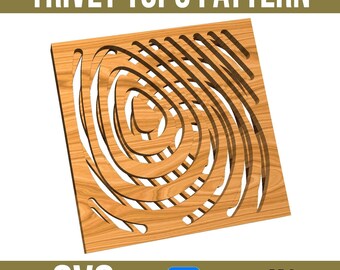 May include: A wooden trivet with a swirling, topographic pattern cut out of the center. The trivet is a square shape and has a light brown wood grain.