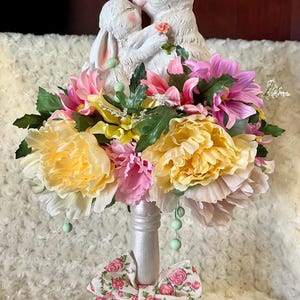Mama and baby bunny blooming candlestick centerpiece