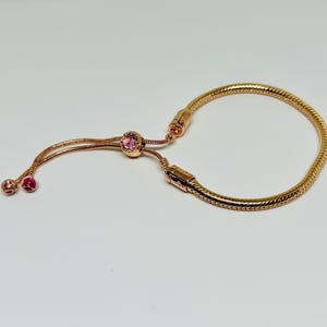 Pandora 14k Rose Gold Slider Bracelet with Pink CZ