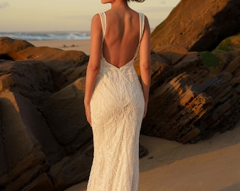 Robe de mariée sirène en dentelle : robe de mariée perlée à la main avec surjupe en tulle