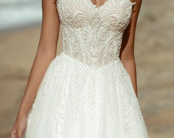 Robe de mariée en tulle avec corsage en dentelle : robe bustier en cœur