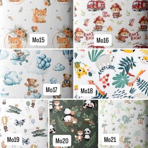 May include: A collage of seven fabric patterns labeled Mo15 through Mo21. Designs include foxes with floral wreaths, fire-fighting animals with fire trucks, teddy bears with balloons and airplanes, jungle animals, aviation motifs, pandas, and palm trees.