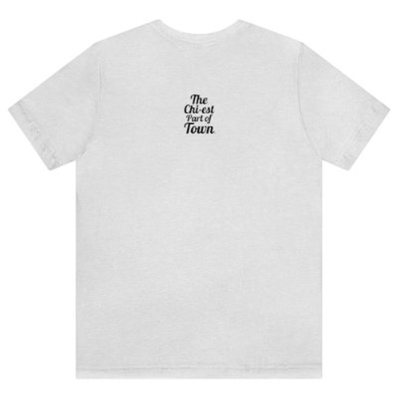 May include: A white t-shirt with black text that reads "The Chi-est Part of Town".