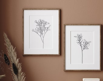 Gallery wall set above bed minimalist boho decor.  Eucalyptus wall hanging triptych line art.