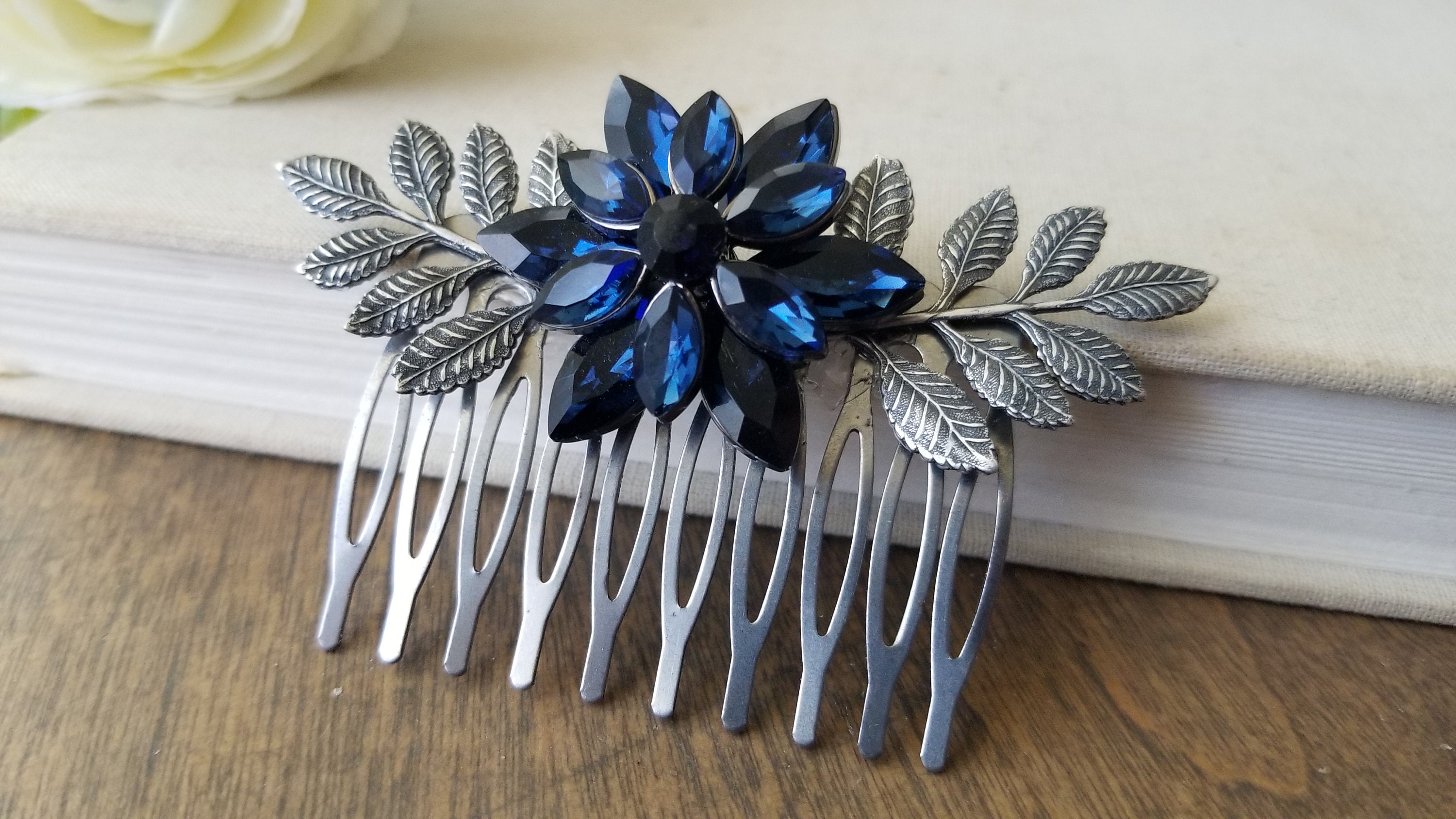 Materials for Creating Jewelry. Navy Blue Rhinestones, Hair Combs, Metal  Flowers on a Paper Background Stock Photo - Image of design, creativity:  194059696
