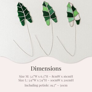 May include: Three stained glass leaf sculptures with wire stems. The leaves are various shades of green, with a mix of solid and textured glass. Size M: 3.1"W x 6.3"H. Size L: 3.9"W x 7.9"H. Including petiole: 19.7".